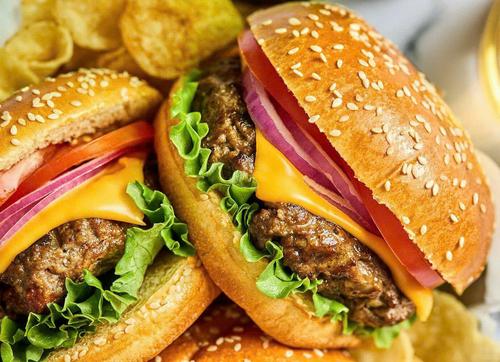 Double Cheeseburger with Onions and Tomatoes