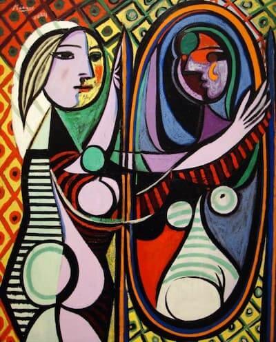 Chica frente a un espejo de Picasso