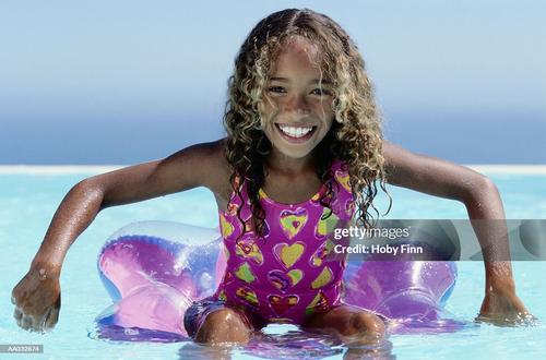 Girl Swimming in the pool